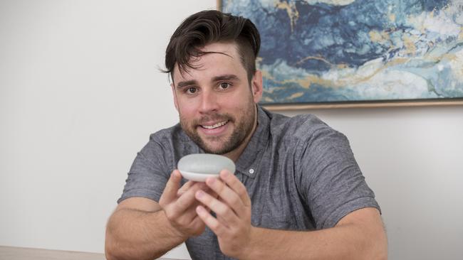 Lightpages CEO Ben Rogers has five smart speakers set up throughout his house to control everything from his lights to his robot vacuum cleaner. Picture: Peter Wallis