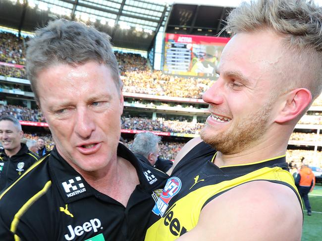 2019 AFL Grand Final. 28/09/2019.  Richmonds Brandon Ellis  hugs coach Damien Hardwick    after the 2019 AFL Grand Final match between the Richmond Tigers and the GWS Giants at the MCG on September 28, 2019 in Melbourne, Australia. Picture: Michael Klein.