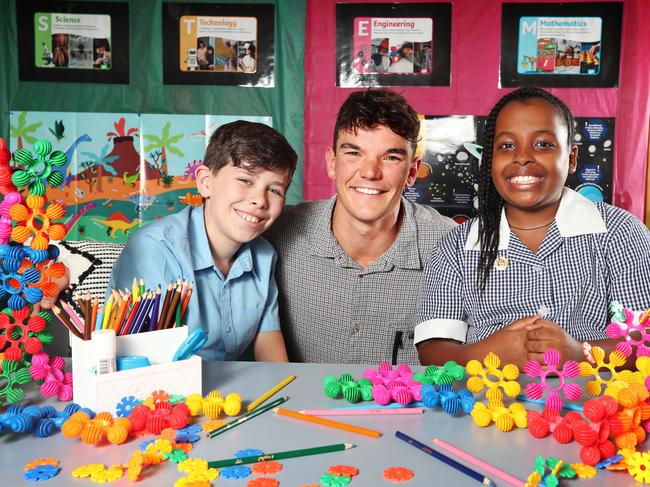 NWK School Pic. St Brendan's Primary School in Flemmington. L-R Max 10 and Shalom 10 with their teacher Mr Madden who they wrote a letter for. Picture Rebecca Michael.