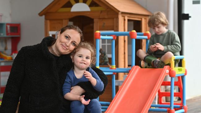 Adelaide mum Natalie Trainor is continuing to manage her mental health at home with daughter Lottie, 2, and son August, 5. Picture: Keryn Stevens