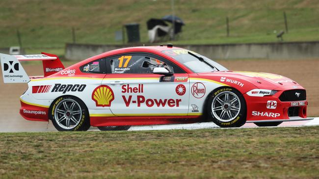 McLaughlin guides his Mustang through the rain to pole position.