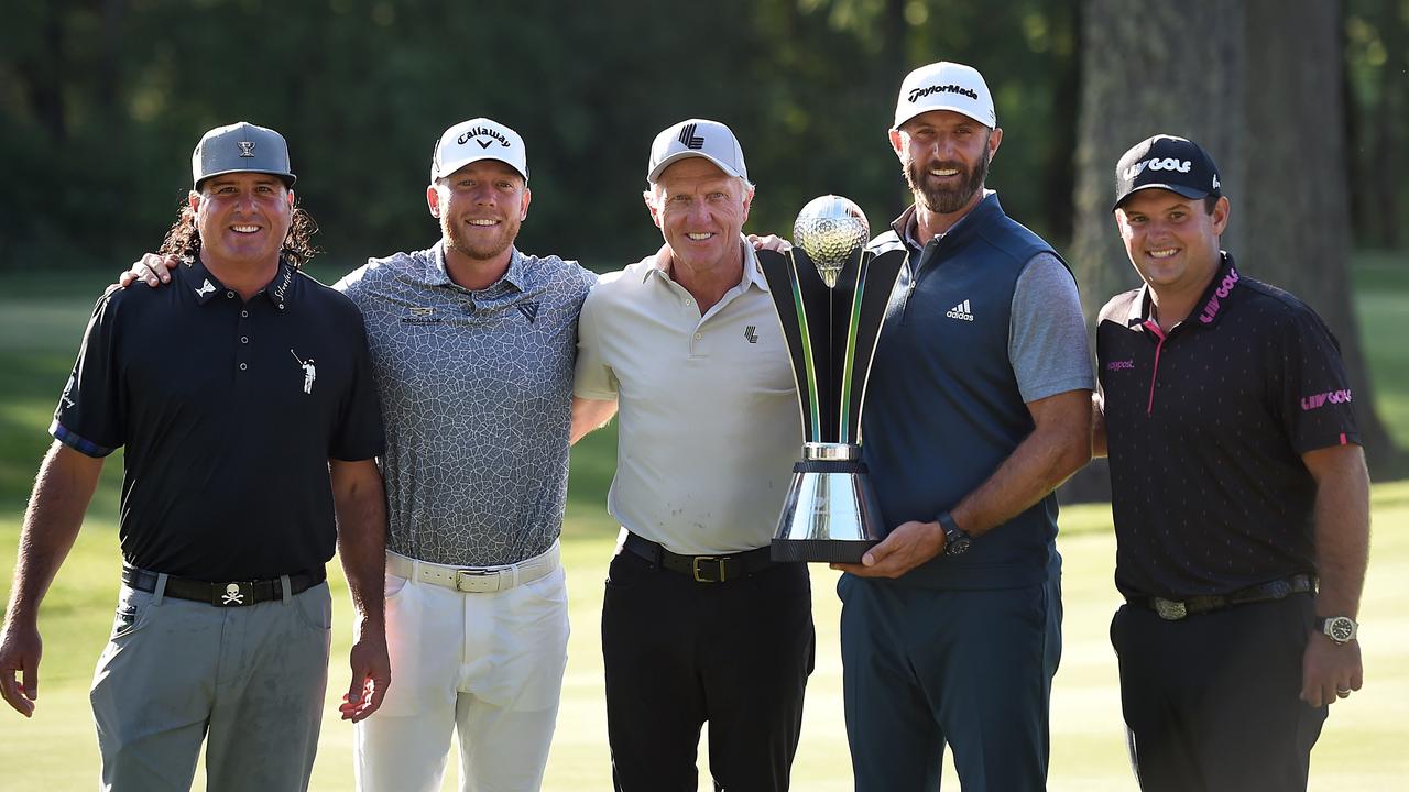 Greg Norman (middle) is leading the charge. (Photo by Steve Dykes/Getty Images)