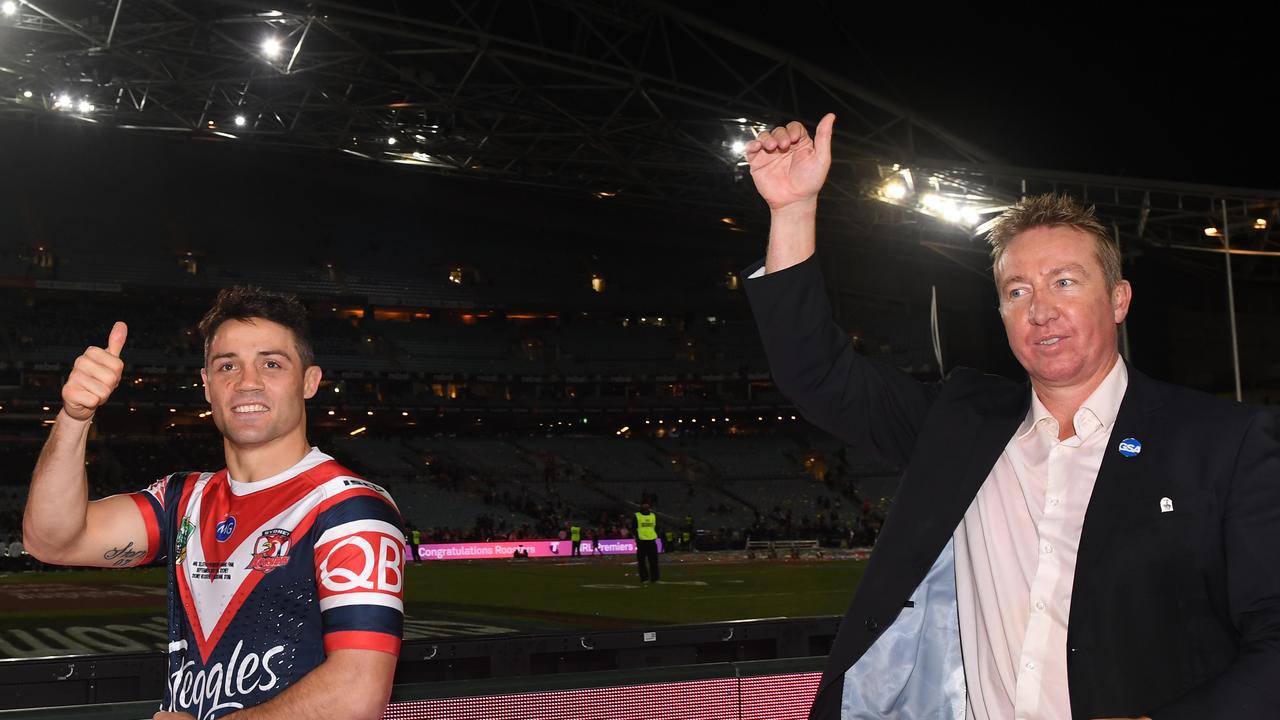 Cooper Cronk and coach Trent Robinson celebrate the GF win.