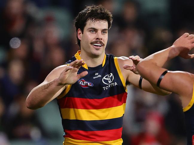 ADELAIDE, AUSTRALIA - JUNE 29: Darcy Fogarty of the Crows celebrates a goal with Josh Rachele during the 2024 AFL Round 16 match between the Adelaide Crows and the GWS GIANTS at Adelaide Oval on June 29, 2024 in Adelaide, Australia. (Photo by Sarah Reed/AFL Photos via Getty Images)