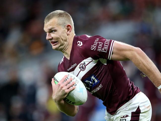 BRISBANE, AUSTRALIA - JULY 24: Tom Trbojevic of the Sea Eagles runs in for a try during the round 19 NRL match between the Manly Sea Eagles and the Wests Tigers at Suncorp Stadium, on July 24, 2021, in Brisbane, Australia. (Photo by Jono Searle/Getty Images)