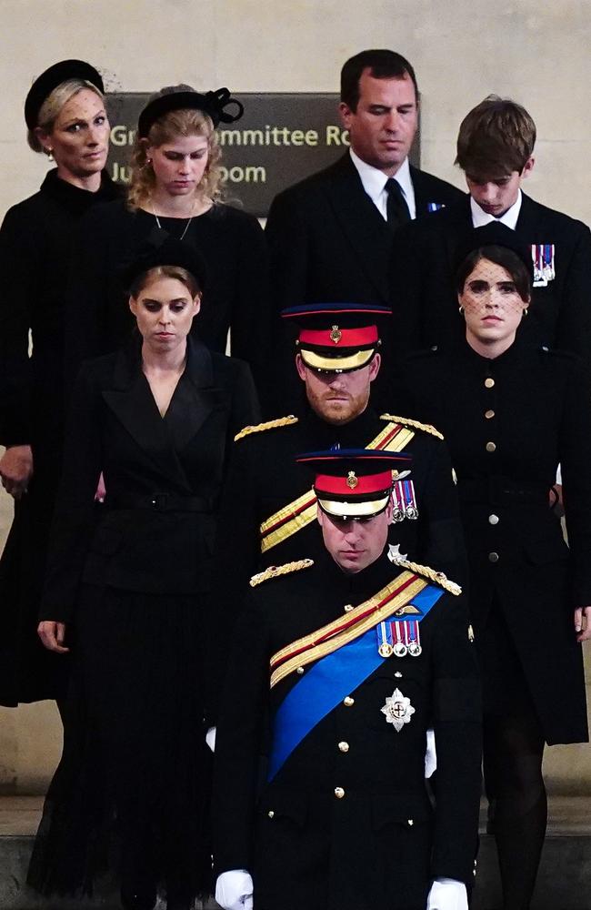 Queen Elizabeth II's eight grandchildren held a family vigil at her coffin on Saturday. Picture: Getty Images