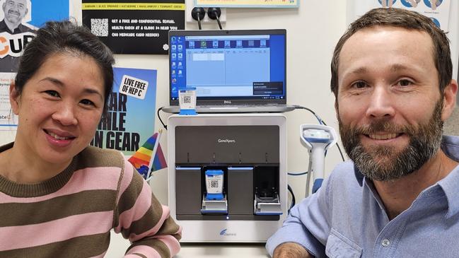 NT Health Viral Hepatitis Clinical Nurse Specialist at Clinic 34 Khim Tan and Dr Dan Wilson with the GeneXpert device used for rapid, point-of-care testing for Hepatitis C in Alice Springs