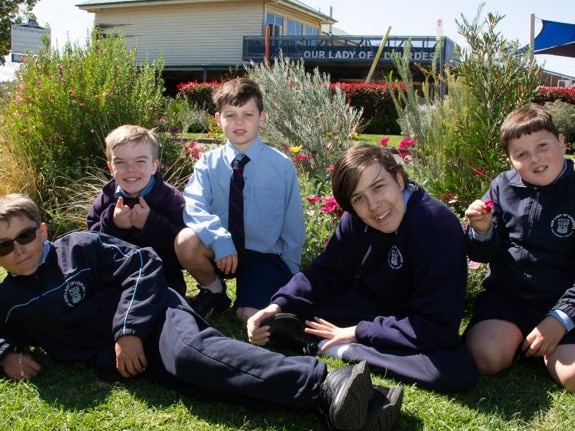 Our Lady of Lourdes students (left to right) Darius Lait, Tyler Shakespeare, Levi Roberts, Tim Furminger and Ben Vidler helping the school prepare for the The Chronicle Garden Competition 2021.