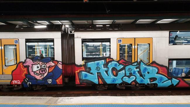 Police attended Leppington Train Station following reports of two men allegedly applying spray paint to train carriages. Picture: NSW Police