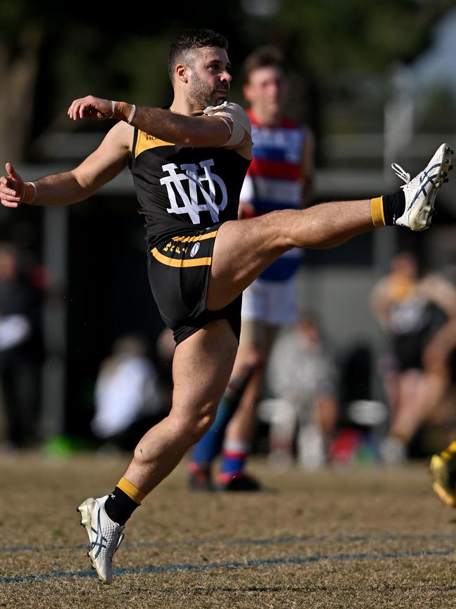 WRFL: Werribee Districts’ Andrew Panayi kicks long. Picture: Andy Brownbill