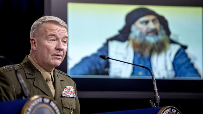 US Central Command Commander Marine General Kenneth McKenzie speaks at the Pentagon in front of a picture of Abu Bakr al-Baghdadi. Picture: AP