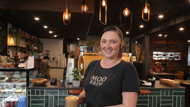 People in Tedder Ave Main Beach give their opinion on the border opening uncertainty. Hot Shott Cafe Supervisor Holly Higgins. Picture Glenn Hampson