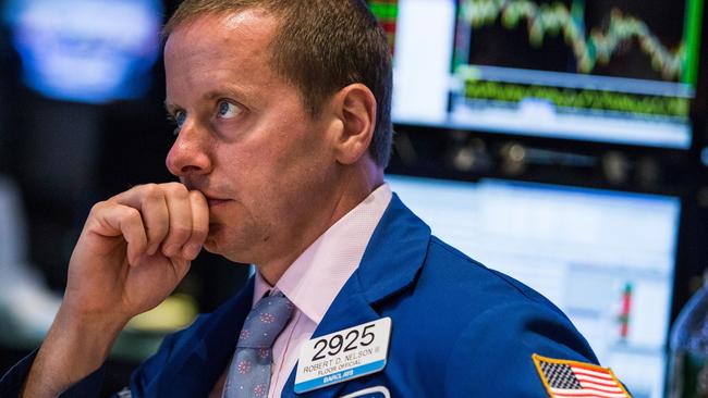 NEW YORK, NY - AUGUST 31: A trader works on the floor of the New York Stock Exchange during the afternoon of August 31, 2015 in New York City. After a volatile day of trading the Dow Jones Industrial Average closed more than 100 points down. Andrew Burton/Getty Images/AFP == FOR NEWSPAPERS, INTERNET, TELCOS & TELEVISION USE ONLY ==