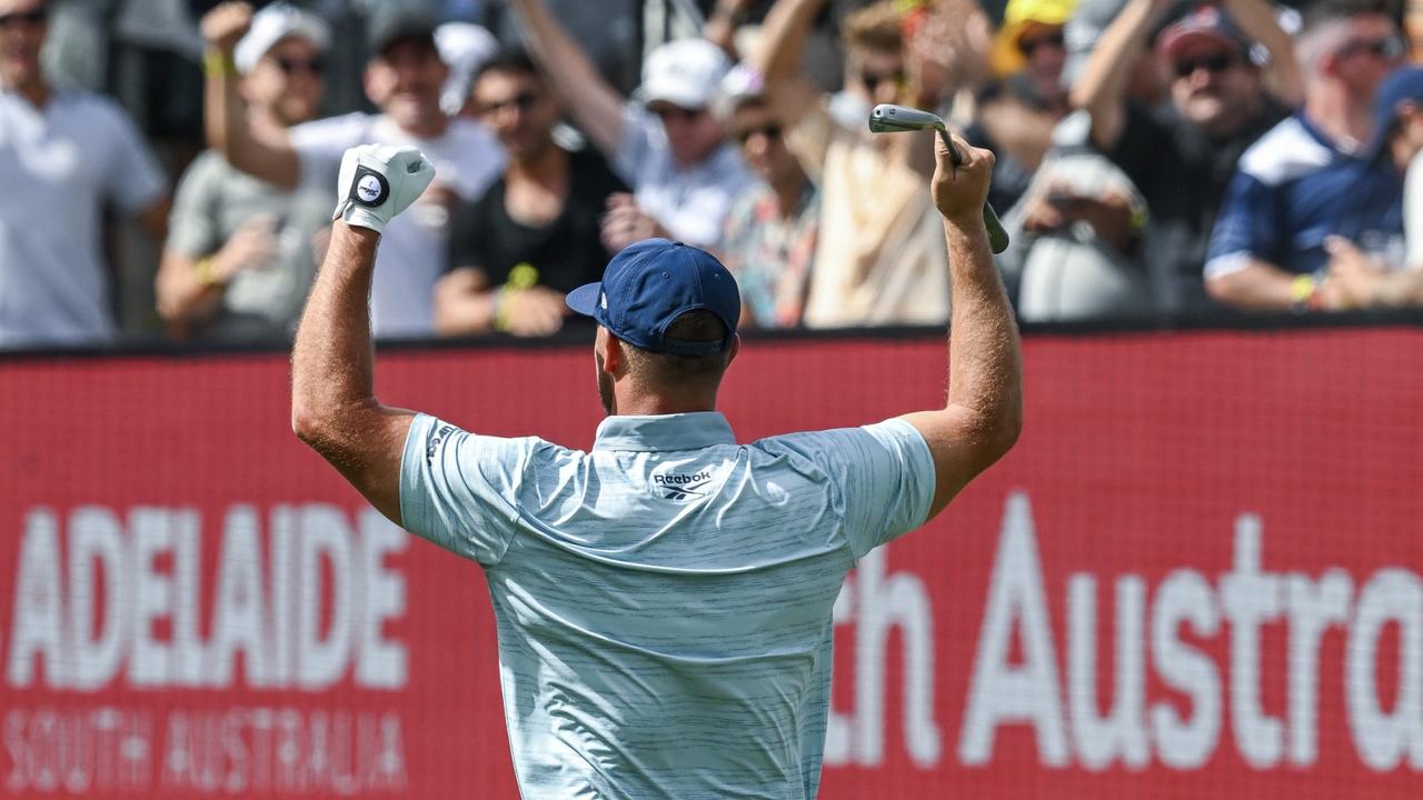 Bryson DeChambeau fires up the crowd on the 12th hole. (Photo by Mark Brake/Getty Images)