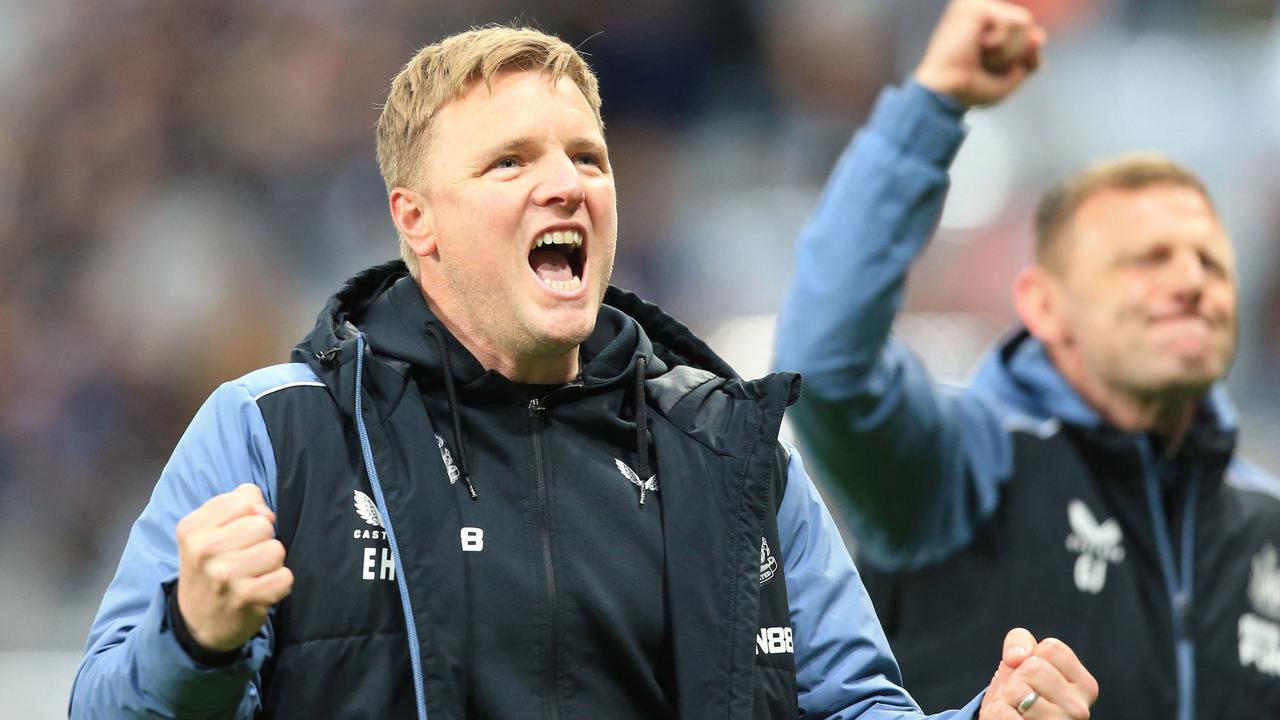 Newcastle manager Eddie Howe roars in delight. (Photo by Lindsey Parnaby / AFP)
