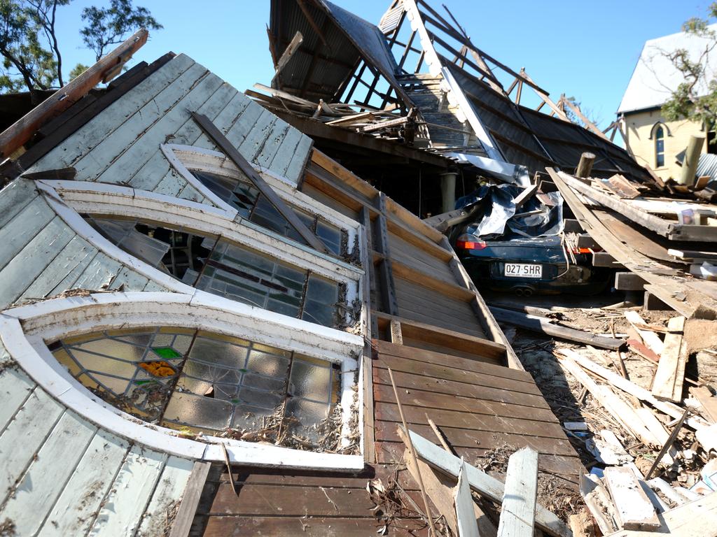 Anthony White's car is still under the remains of the church destroyed by cyclone Marcia. Photo Allan Reinikka / The Morning Bulletin