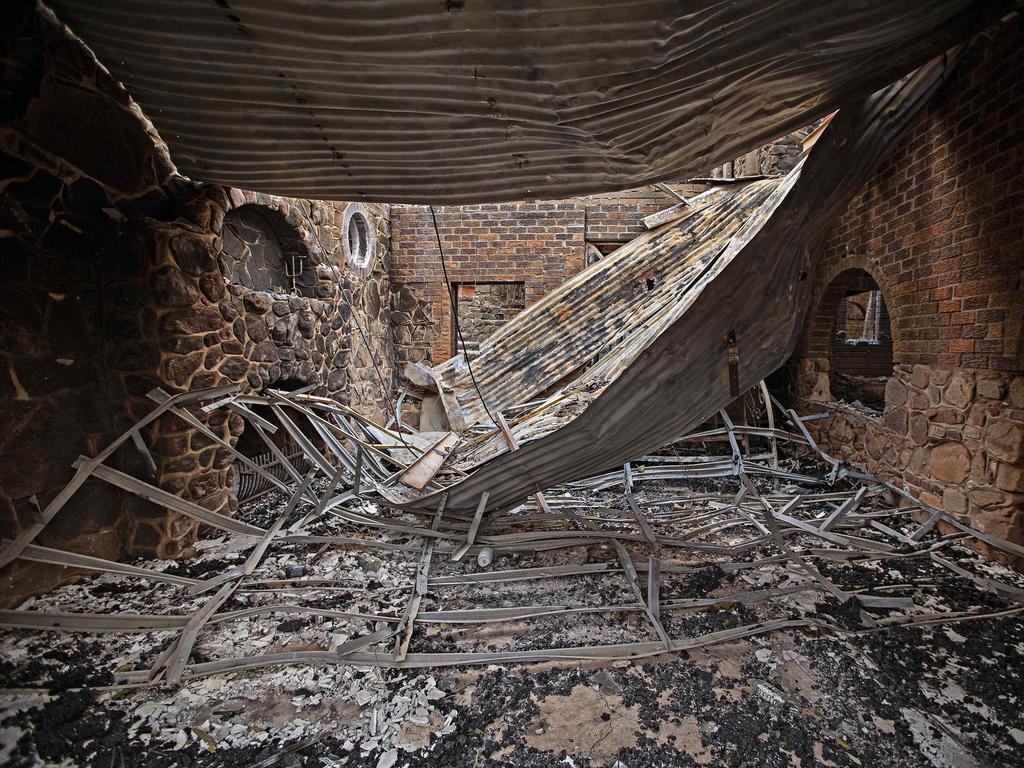 Fire devastated "castle" home in the small community of Wytaliba on the 13th of November 2019. Bushfires ripped through the small community of Wytaliba on the 9th of November 2019. Photographer: Adam Yip