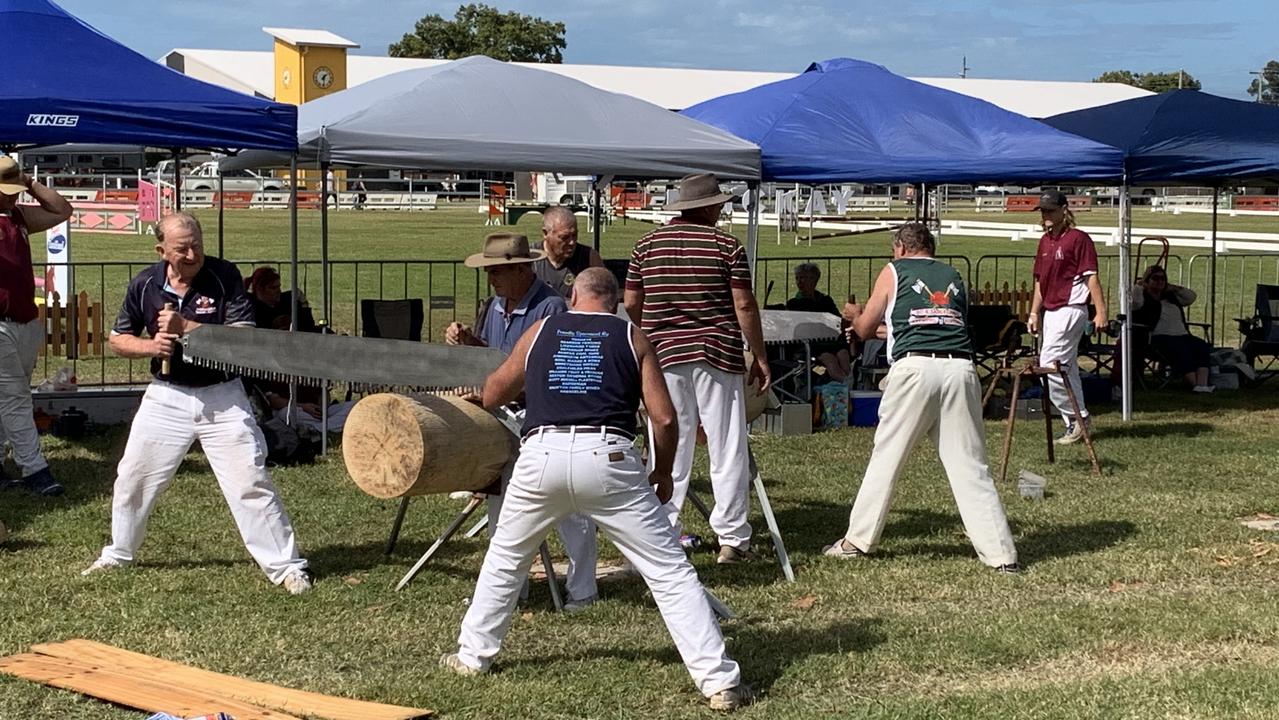 Men prepare to compete in a cross saw competition at the Mackay Show on Thursday, June 16. Picture: Duncan Evans