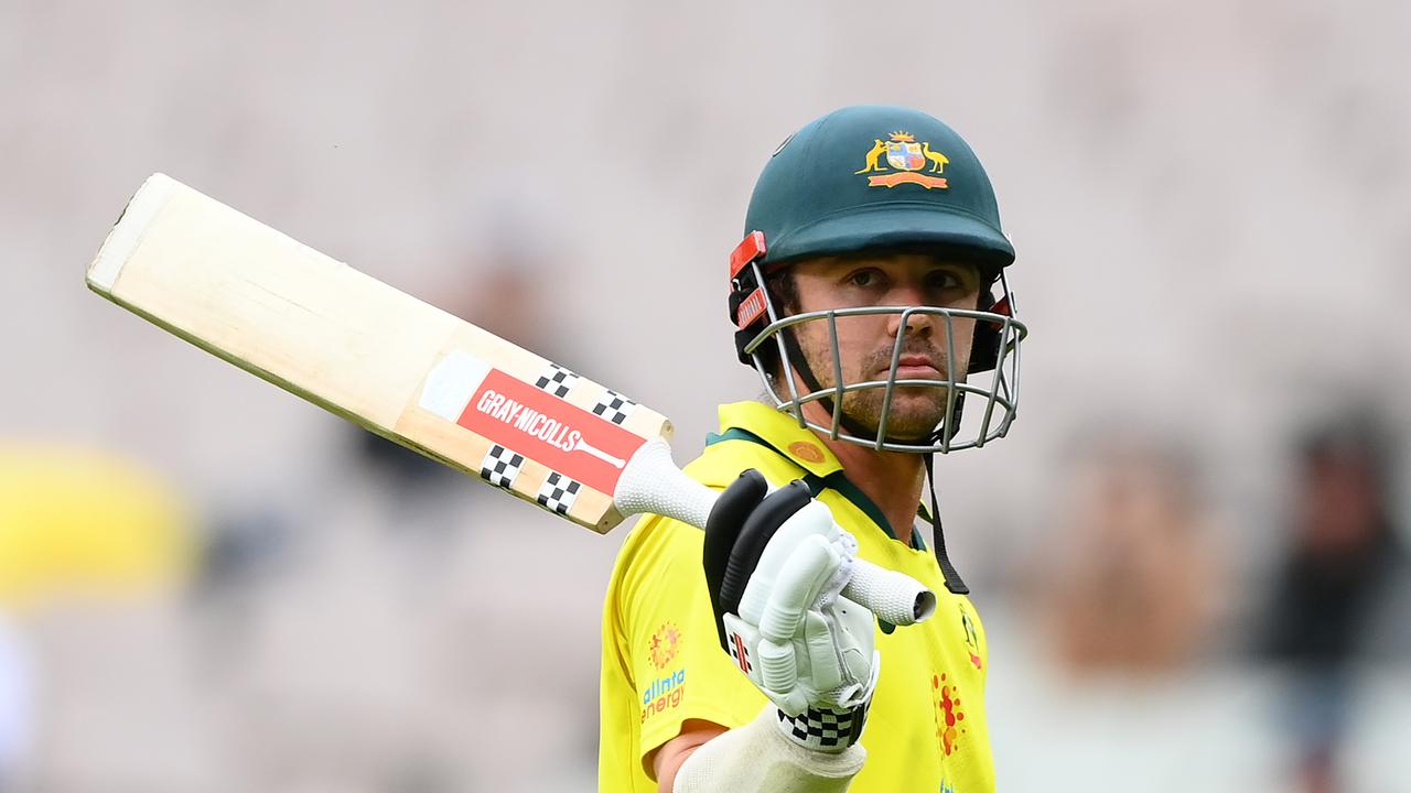 Travis Head waves his bat to the small crowd after being dismissed for 152. Picture: Quinn Rooney/Getty Images