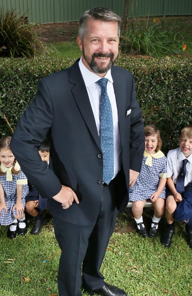 John Colet School's new headmaster Julian Wilcock with Lower 1 pupils on their first day. Picture: Troy Snook