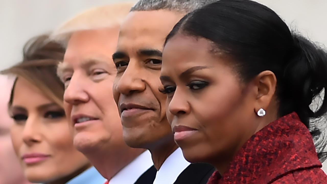 First Lady Melania Trump, President Donald Trump, former president Barack Obama and a clearly unimpressed Michelle Obama at the 2017 inauguration ceremony. Picture: AFP Photo/ Jim Watson