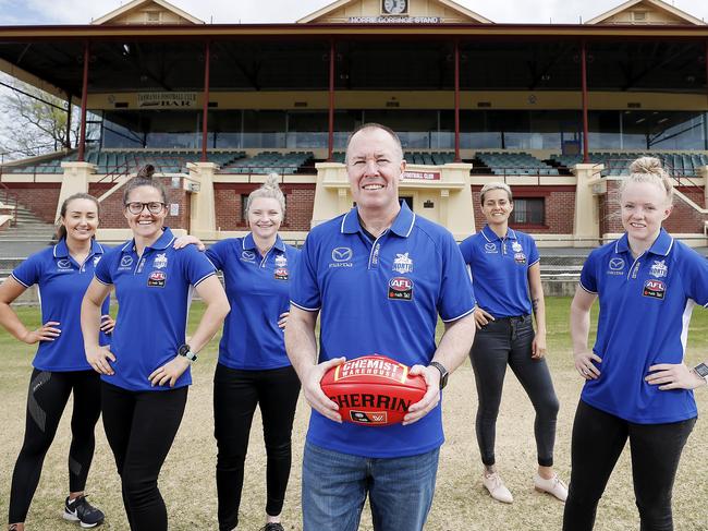 Tassie Kangaroos coach Scott Gowans with players, from left, Nicole Bresnehan, Emma Kearney, Daria Bannister, Moana Hope and Emma Humphries at North Hobart Oval. Picture: RICHARD JUPE