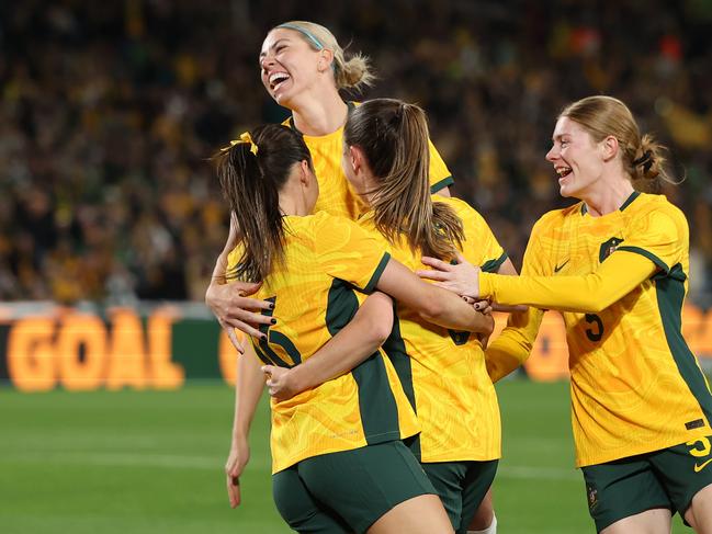 SYDNEY, AUSTRALIA - JUNE 03: Clare Wheeler of Australia celebrates scoring a goal during the international friendly match between Australia Matildas and China PR at Accor Stadium on June 03, 2024 in Sydney, Australia. (Photo by Mark Metcalfe/Getty Images)