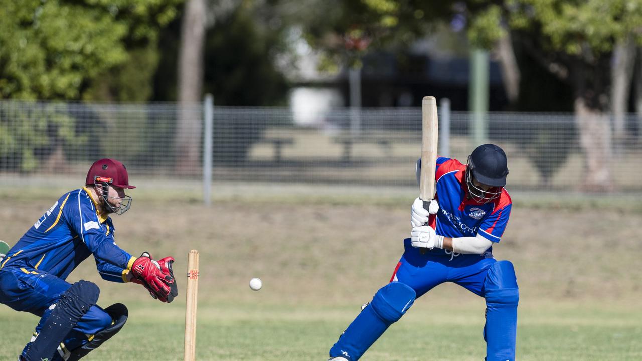 University wicketkeeper Dean Sullivan and Arshdeep Singh batting for Highfields against University. Picture: Kevin Farmer