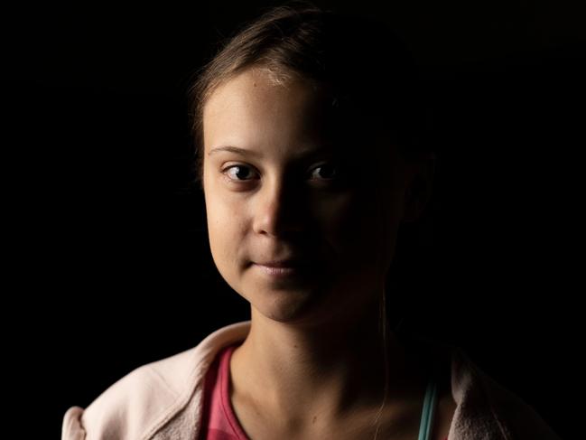 TOPSHOT - Teen activist Greta Thunberg poses for a picture after an interview ahead of the Global Climate Strike march on September 20, 2019 in New York City. - Crowds of children skipped school to join a global strike against climate change, heeding the rallying cry of teen activist Greta Thunberg and demanding adults act to stop environmental disaster. It was expected to be the biggest protest ever against the threat posed to the planet by climate change. (Photo by Johannes EISELE / AFP)