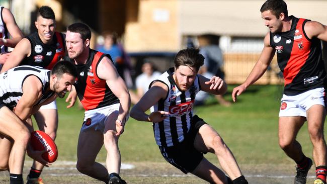 Pierce Seymour (far right) in action for Payneham Norwood Union during the 2019 division one Adelaide Footy League grand final against Prince Alfred Old Collegians. Picture: AAP/ Keryn Stevens