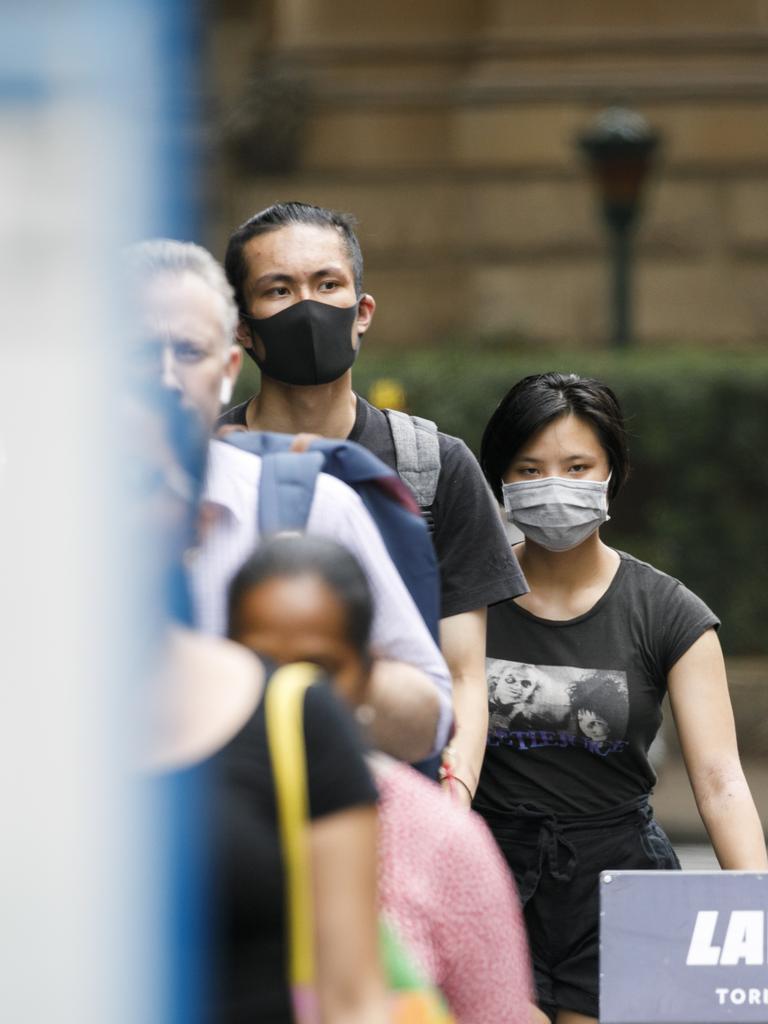 Mask are commonly now being worn around the Sydneys CBD due to the fear of the Coronavirus. Photo: Tim Pascoe