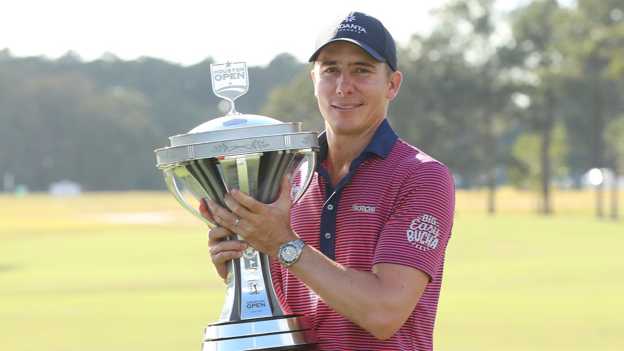 Carlos Ortiz poses with the trophy after winning the Houston Open.
