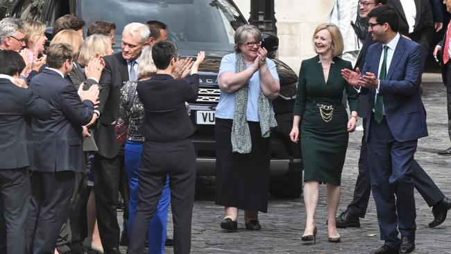 Supporters applaud Britain’s Foreign Secretary Liz Truss as she leaves the Houses of Parliament in London overnight (AEST). Picture: AFP