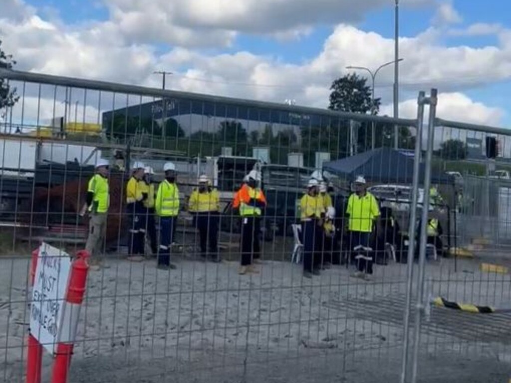 Workers inside the site after it was locked up.