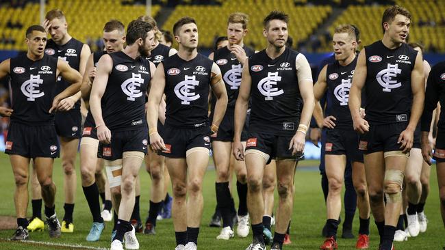 Blues players look dejected. (AAP Image/Daniel Pockett)