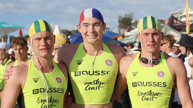 Cooks Hill star Alex Walker (middle) alongside Luke and Sam Higgs from North Curl Curl. Picture: SLSA.