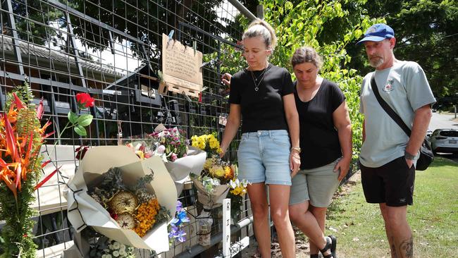 Allan Smillie's nieces Melissa Griffin and Kristy Marshall with husband Chris Griffin. Picture: Liam Kidston