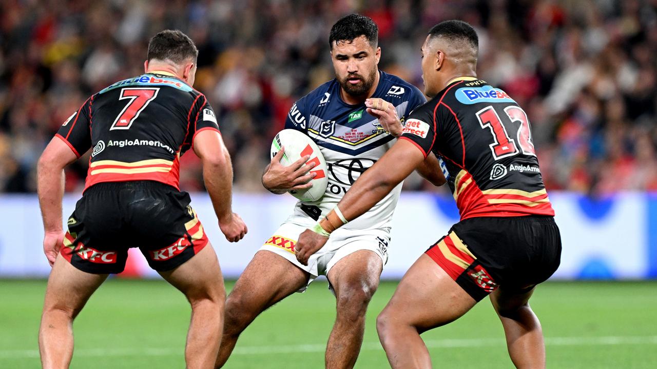 Peta Hiku looks to take on the Dolphins defence. (Photo by Bradley Kanaris/Getty Images)