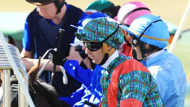 Jockeys in the barriers, Christian Reith featured, for the running of race 1 during Scone Races located in the Upper Hunter Region of NSW. Pic Jenny Evans
