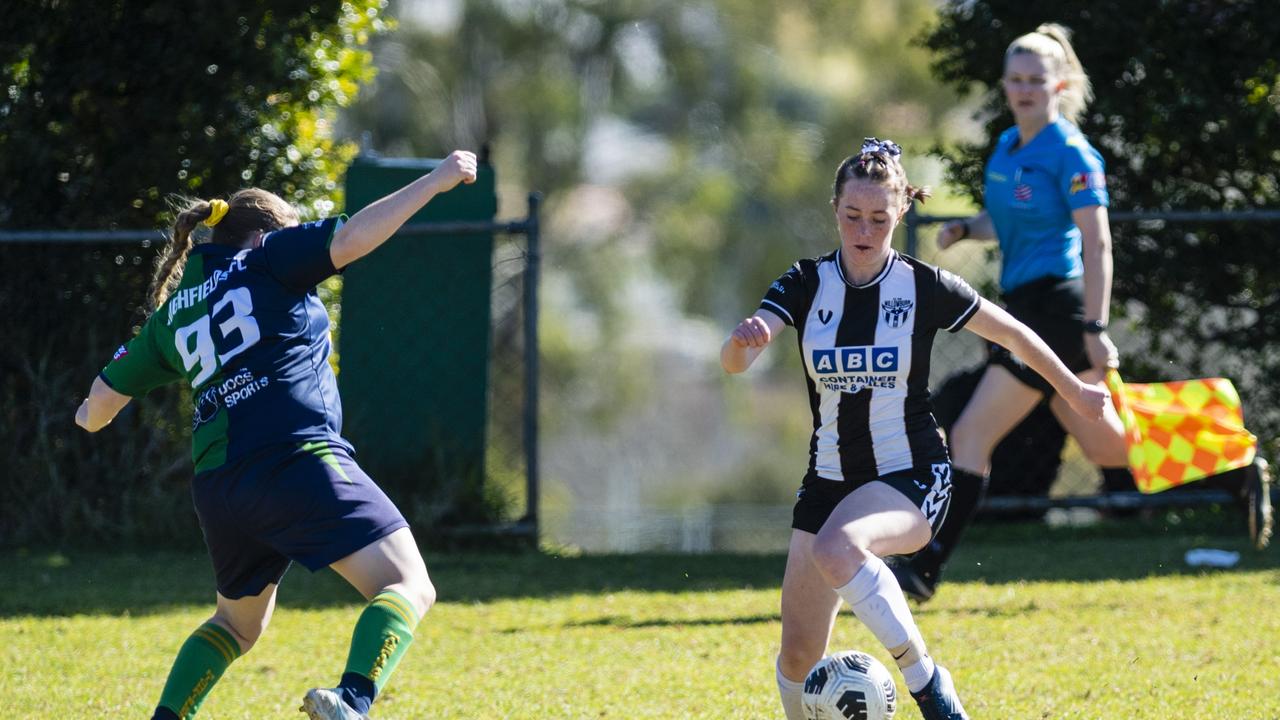 Marlina-Rae Pern (left) of Highfields defends against an attack from Jade Gaske of Willowburn in FQPL Women Darling Downs Presidents Cup football at West Wanderers, Sunday, July 24, 2022. Picture: Kevin Farmer