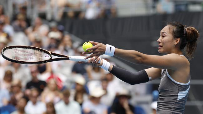 Eliminated 2024 finalist Qinwen Zheng remonstrates with the chair umpire after being handed a code violation in the second set. Picture: Daniel Pockett / Getty Images