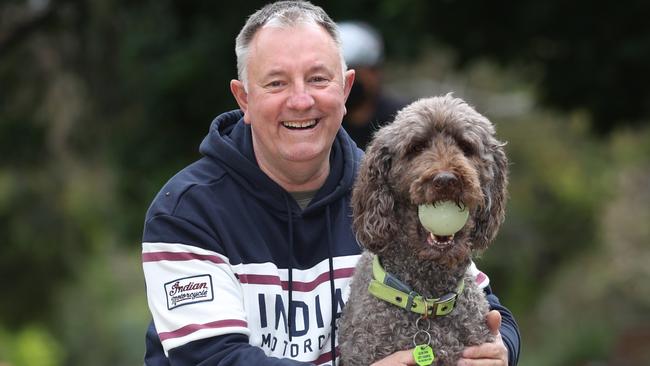 Grayham Bottomley was treated for an enlarged prostate and now problem solved. Grayham on a daily walk with his dog Molly at the park.                                                             Picture: David Caird