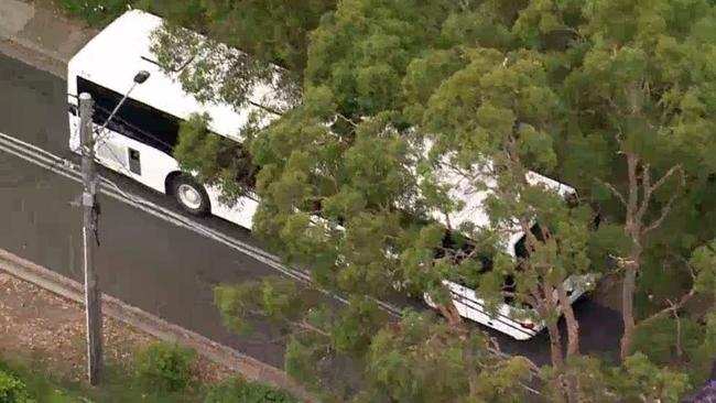 A school bus carrying about 40 children has collided with a car in Grays Point, leaving two children injured. Picture: 7News