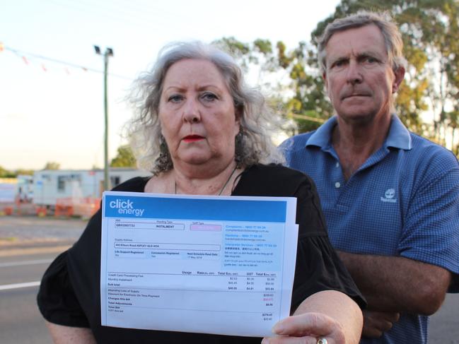 Cheryl and Richard Perkins with the bill that includes the electricity charge that should have gone to the council's contractor. Picture: Ellen-Maree Elliot