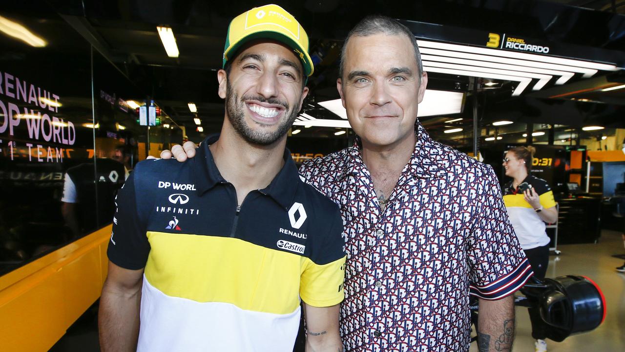 Robbie Williams, pictured with Aussie Formula One driver Daniel Ricciardo, was last here for the 2020 Australian Grand Prix, which was cancelled due to Covid-19. Picture David Caird