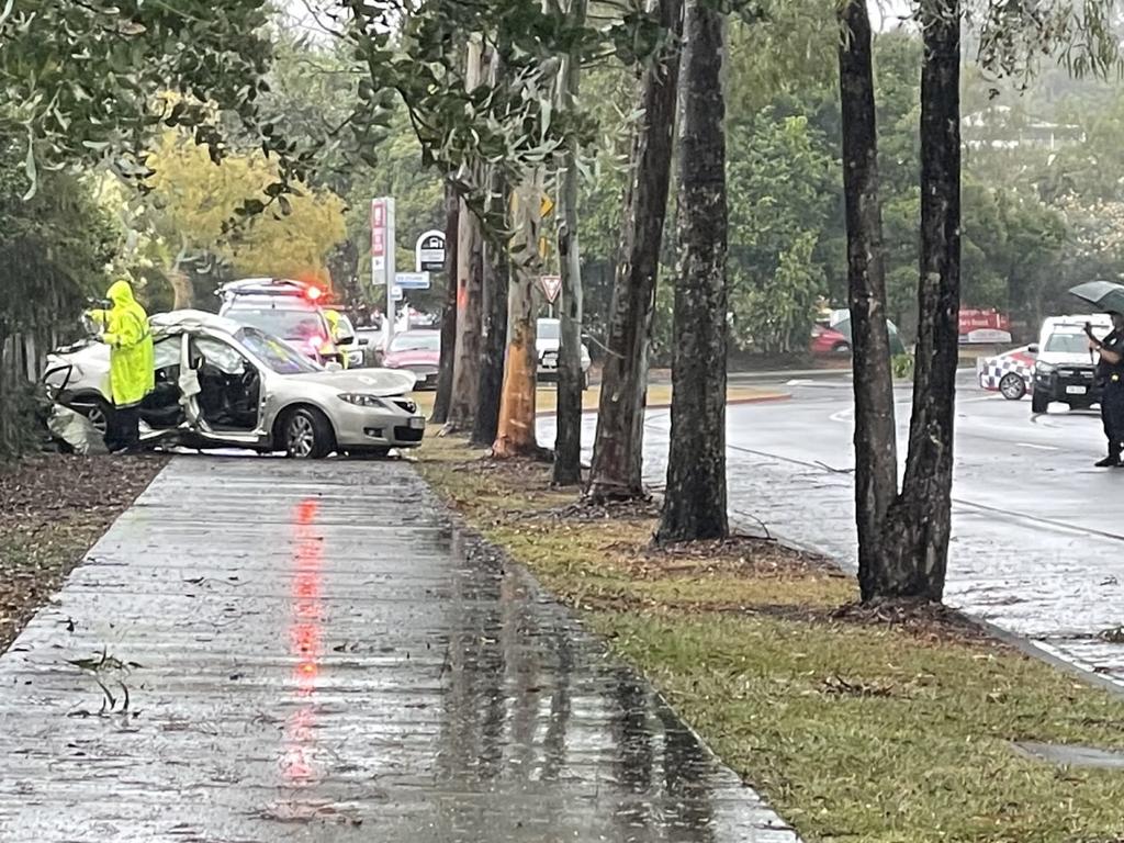 Emergency services were called to Myall Court in Narangba at 1:55pm after a car crashed into a fence, leaving the driver and one passenger trapped inside.