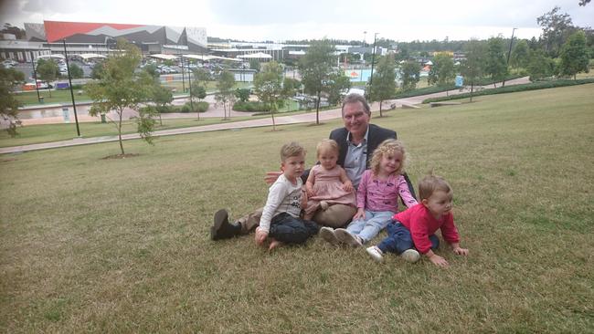 Cr David Morrison with grandchildren (who all live in Ipswich City) Judah, Matilda, Hope and Eden overlooking Orion Lagoon. Photo: Alex Moore