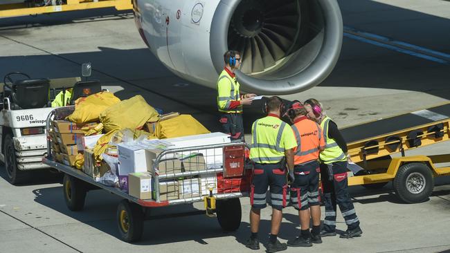 Qantas airport baggage handlers, whose jobs were outsourced last year, have scored a critical victory in the Federal Court.
