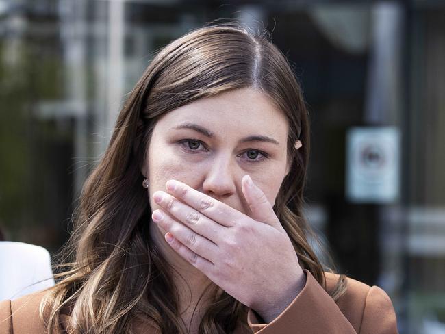 CANBERRA, AUSTRALIA NewsWire Photos OCTOBER 27, 2022:An upset Brittany Higgins with her partner David Sharaz left the Magistrates Court in Canberra. Her mum Kelly Higgins was with her.Picture: NCA NewsWire / Gary Ramage