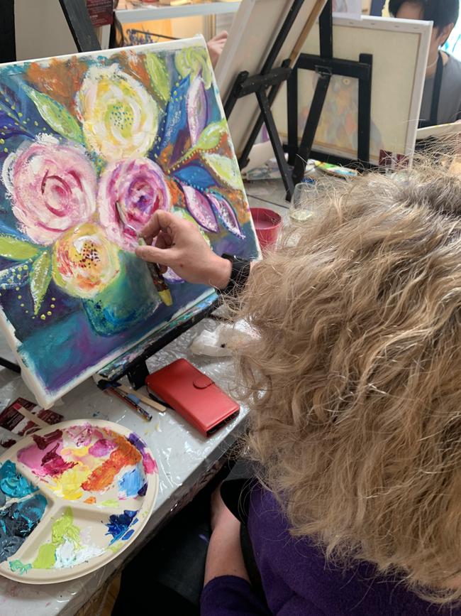 Sipping wine and painting, what could be more relaxing? Picture: Supplied by Art Innovations Gallery